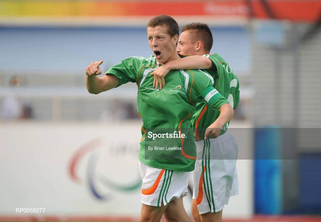 16 September 2008; Ireland's Luke Evans, from Artane, Dublin, left, celebrates with team-mate Mark Jones, from Belfast, Antrim, after his side's first goal. Ireland finished 6th overall for the competition after a 4-2 defeat to the Dutch, the result is an improvement of 2 places on their Athens finish four years ago. Beijing Paralympic Games 2008, Ireland v Great Britain, 7-A-Side Soccer, 5th-6th Place - Match 18, Olympic Green Hockey Field A, Beijing, China. Picture credit: Brian Lawless / SPORTSFILE