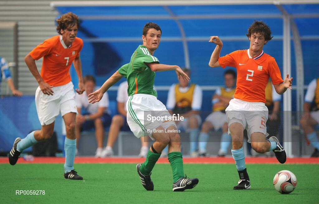 16 September 2008; Gary Messett, Ireland, from Bray, Wicklow, in action against Johannes Straatman, left, and Johannes Voogd, Holland. Ireland finished 6th overall for the competition after a 4-2 defeat to the Dutch, the result is an improvement of 2 places on their Athens finish four years ago. Beijing Paralympic Games 2008, Ireland v Great Britain, 7-A-Side Soccer, 5th-6th Place - Match 18, Olympic Green Hockey Field A, Beijing, China. Picture credit: Brian Lawless / SPORTSFILE