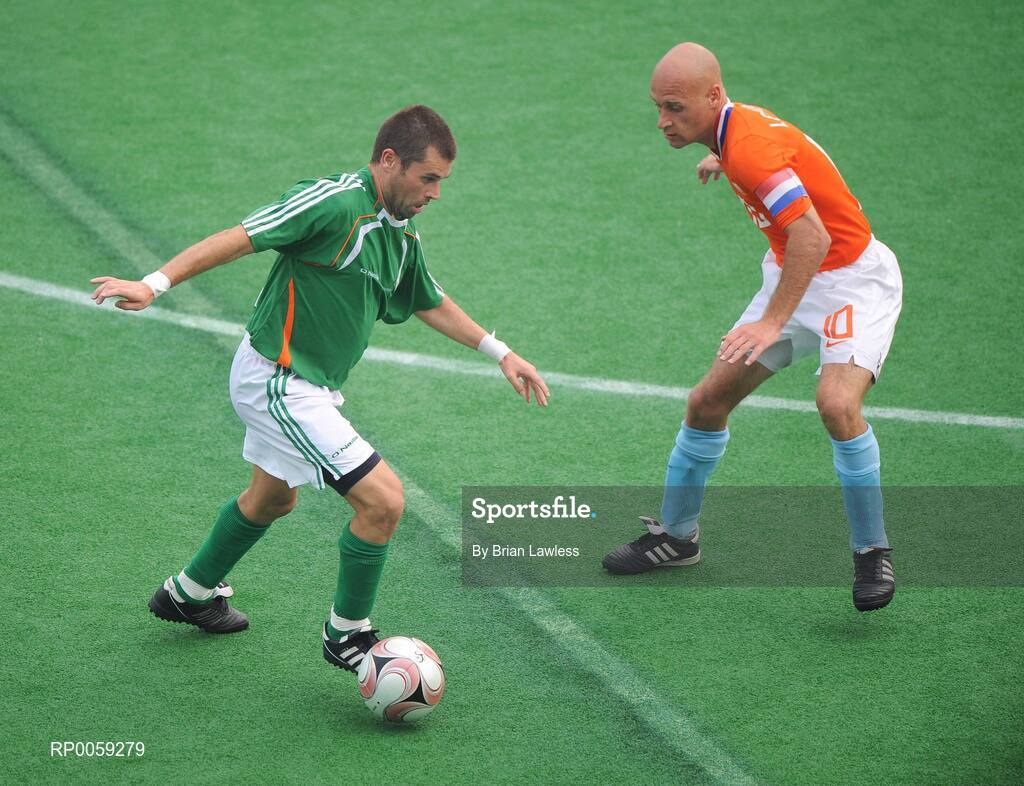 16 September 2008; Finbarr O'Riordan, Ireland, from Mitchelstown, Cork, in action against Stephen Lokhoff, Holland. Ireland finished 6th overall for the competition after a 4-2 defeat to the Dutch, the result is an improvement of 2 places on their Athens finish four years ago. Beijing Paralympic Games 2008, Ireland v Great Britain, 7-A-Side Soccer, 5th-6th Place - Match 18, Olympic Green Hockey Field A, Beijing, China. Picture credit: Brian Lawless / SPORTSFILE