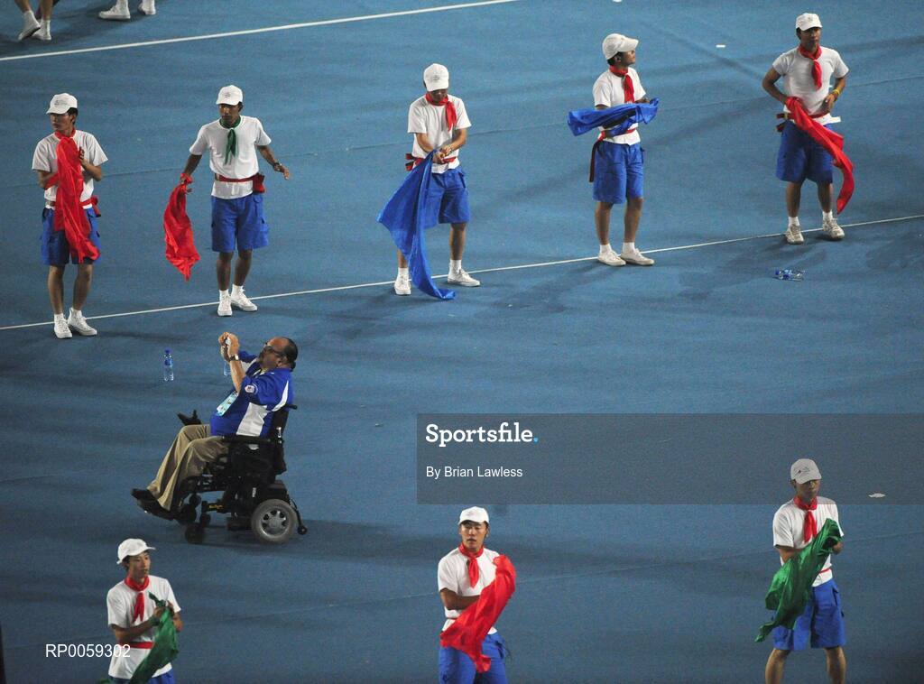 16 September 2008; A paralympic athlete takes photographs during the Closing Ceremony. Beijing Paralympic Games 2008, Closing Ceremony, National Stadium, Olympic Green, Beijing, China. Picture credit: Brian Lawless / SPORTSFILE
