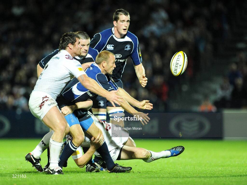 19 September 2008; Chris Whitaker, Leinster, is tackled by David Bishop and Huw Bennett, left, Ospreys. Magners League, Leinster v Neath Swansea Ospreys, RDS, Dublin. Picture credit: Brendan Moran / SPORTSFILE