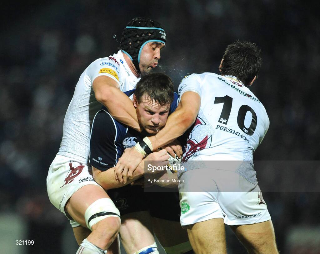 19 September 2008; Malcolm O'Kelly, Leinster, is tackled by John Thomas, left, and James Hook, Ospreys. Magners League, Leinster v Neath Swansea Ospreys, RDS, Dublin. Picture credit: Brendan Moran / SPORTSFILE