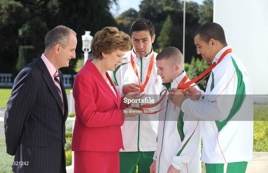 20 September 2008; Irish Olympic medallists Darren Sutherland, right, Paddy Barnes and Kenny Egan, centre, with President Mary McAleese and Dr. Martin McAleese during a reception for the Irish athletes, coaches and officials who represented Ireland at the Beijing Olympics, hosted by President Mary McAleese at Aras an Uachtaran. Irish Olympians visit Aras an Uachtarain, Phoenix Park, Dublin. Picture credit: Brendan Moran / SPORTSFILE