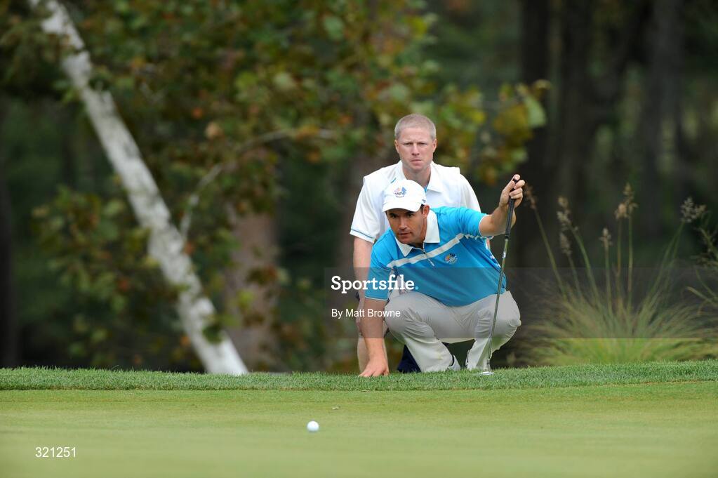 20 September 2008; Padraig Harrington, Team Europe 2008, lines up a putt on the 8th green with caddy Ronan Flood during the morning foursome. 37th Ryder Cup, Valhalla Golf Club, Louisville, Kentucky, USA. Picture credit: Matt Browne / SPORTSFILE