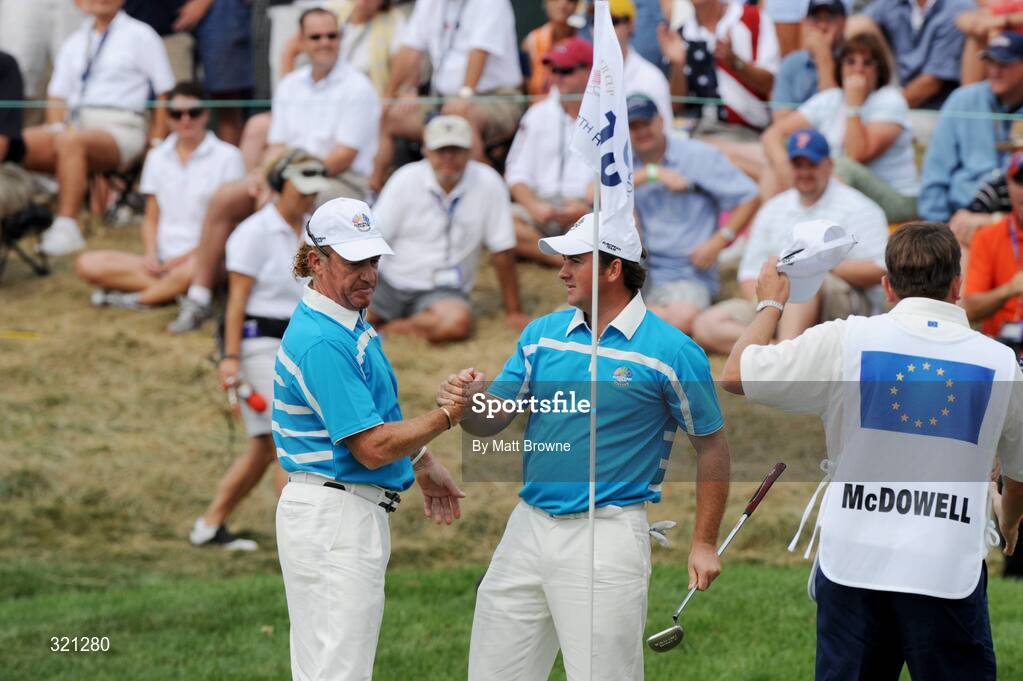 20 September 2008; Graeme McDowell, Team Europe 2008, celebrates his birdie putt with team-mate Miguel Angel Jimenez on the 18th green to half the match with Justin Leonard and Hunter Mahan, Team USA 2008, during the morning foursome. 37th Ryder Cup, Valhalla Golf Club, Louisville, Kentucky, USA. Picture credit: Matt Browne / SPORTSFILE