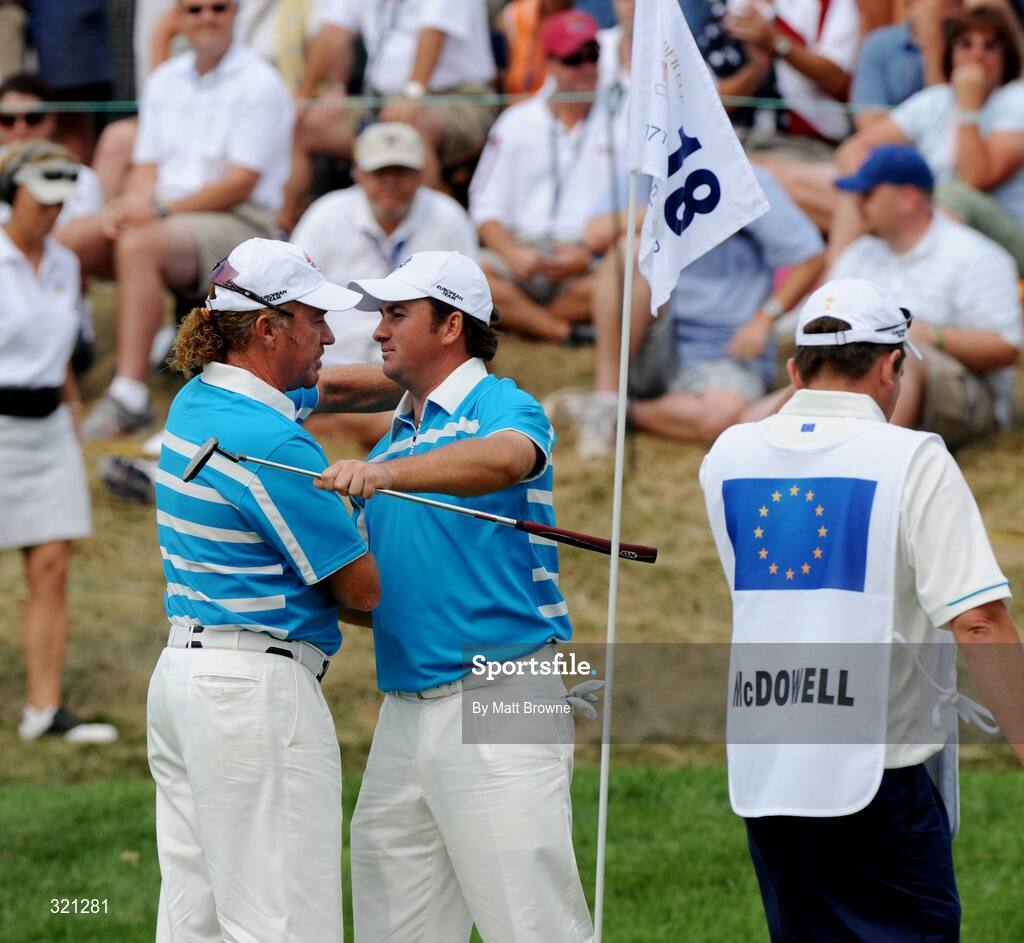 20 September 2008; Graeme McDowell, Team Europe 2008, celebrates his birdie putt with team-mate Miguel Angel Jimenez on the 18th green to half the match with Justin Leonard and Hunter Mahan, Team USA 2008, during the morning foursome. 37th Ryder Cup, Valhalla Golf Club, Louisville, Kentucky, USA. Picture credit: Matt Browne / SPORTSFILE