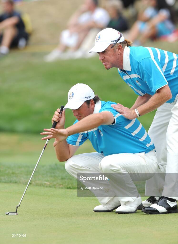 20 September 2008; Graeme McDowell and team-mate Miguel Angel Jimenez, Team Europe 2008, line up a birdie putt on the 18th green during the morning foursome. 37th Ryder Cup, Valhalla Golf Club, Louisville, Kentucky, USA. Picture credit: Matt Browne / SPORTSFILE