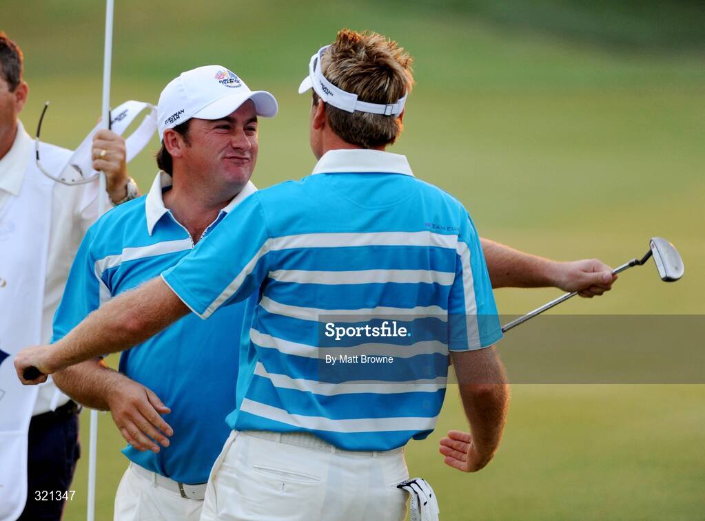 20 September 2008; Graeme McDowell celebrates with Ian Poulter, Team Europe 2008, on the 18th green after defeating Kenny Perry and Jim Furyk during the afternoon four-ball. 37th Ryder Cup, Valhalla Golf Club, Louisville, Kentucky, USA. Picture credit: Matt Browne / SPORTSFILE
