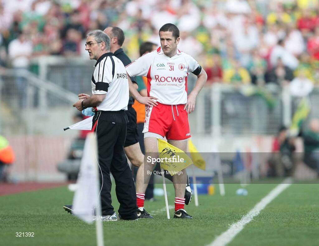21 September 2008; Tyrone's Stephen O'Neill gets ready to enter the game as Tyrone manager Mickey Harte looks to the bench. GAA Football All-Ireland Senior Championship Final, Kerry v Tyrone, Croke Park, Dublin. Picture credit: Oliver McVeigh / SPORTSFILE