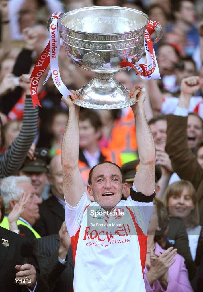 21 September 2008; Tyrone captain Brian Dooher lifts the Sam Maguire Cup after victory over Kerry. GAA Football All-Ireland Senior Championship Final, Kerry v Tyrone, Croke Park, Dublin. Picture credit: Brendan Moran / SPORTSFILE