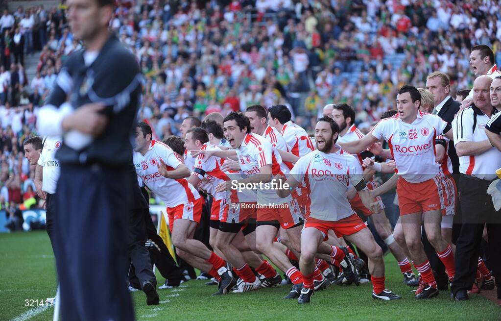 21 September 2008; Tyrone substitutes Paul Quinn, 32, Martin Penrose, 29 and Cathal McCarron, 22, celebrate victory at the final whistle as Kerry manager Pat O'Shea looks on. GAA Football All-Ireland Senior Championship Final, Kerry v Tyrone, Croke Park, Dublin. Picture credit: Brendan Moran / SPORTSFILE