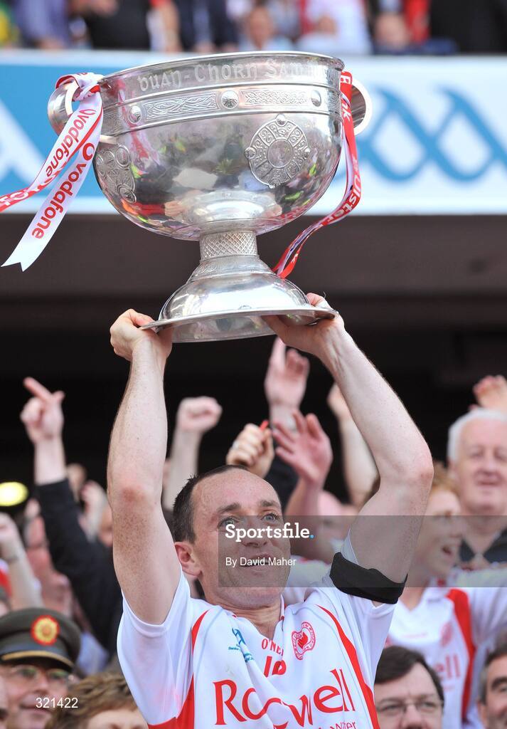 21 September 2008; Tyrone captain Brian Dooher lifts the Sam Maguire Cup after victory over Kerry. GAA Football All-Ireland Senior Championship Final, Kerry v Tyrone, Croke Park, Dublin. Picture credit: David Maher / SPORTSFILE