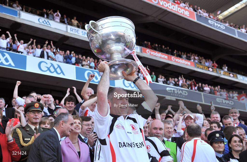 21 September 2008; Tyrone manager Mickey Harte lifts the Sam Maguire Cup after victory over Kerry. GAA Football All-Ireland Senior Championship Final, Kerry v Tyrone, Croke Park, Dublin. Picture credit: David Maher / SPORTSFILE