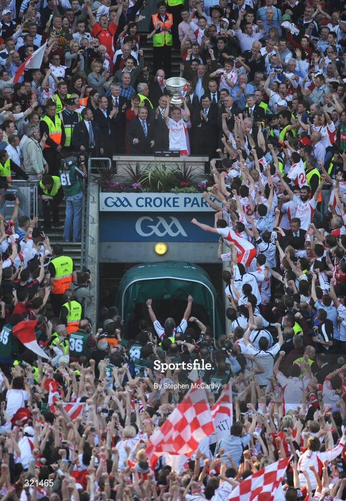 21 September 2008; Tyrone captain Brian Dooher lifts the Sam Maguire cup. GAA Football All-Ireland Senior Championship Final, Kerry v Tyrone, Croke Park, Dublin. Picture credit: Stephen McCarthy / SPORTSFILE