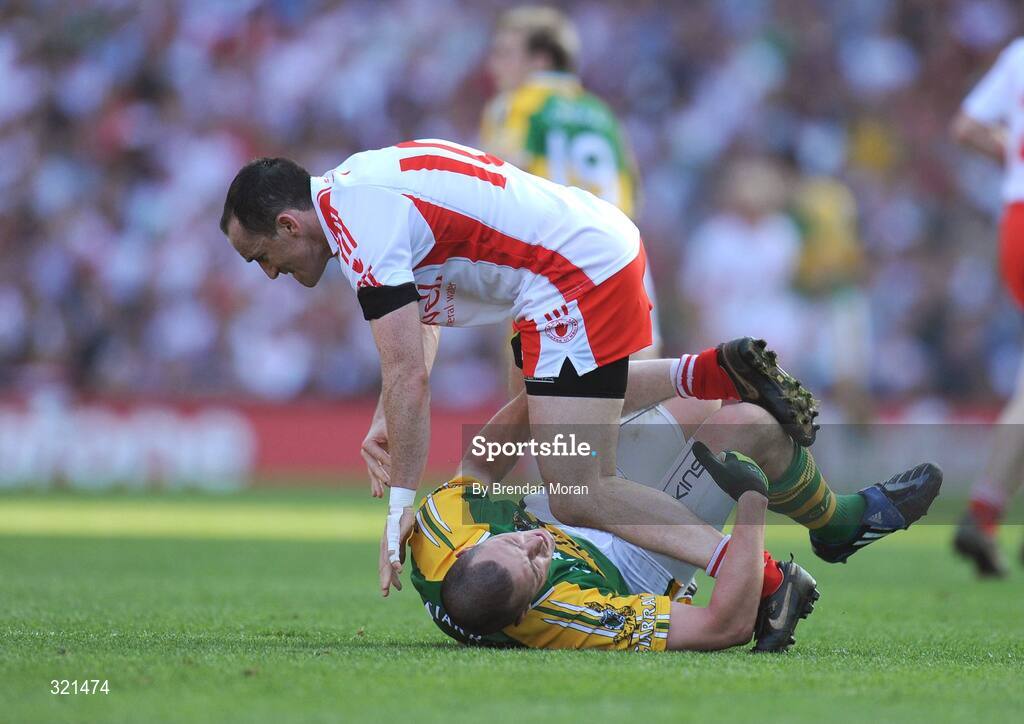 21 September 2008; Brian Dooher, Tyrone, steps over Kieran Donaghy, Kerry. GAA Football All-Ireland Senior Championship Final, Kerry v Tyrone, Croke Park, Dublin. Picture credit: Brendan Moran / SPORTSFILE