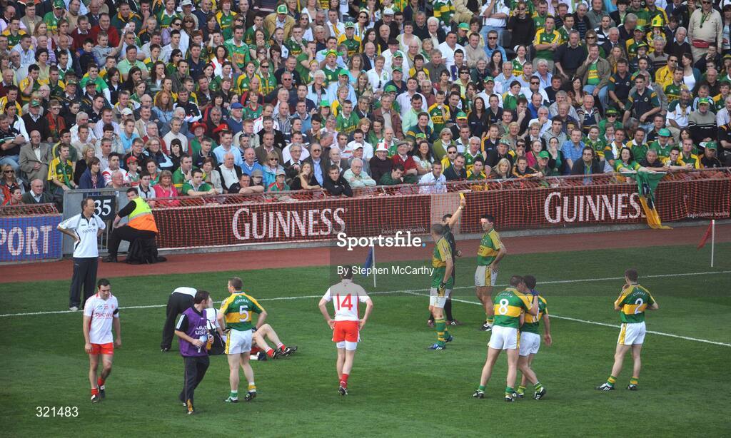 21 September 2008; Aidan O'Mahony, Kerry, receives a yellow card from referee Maurice Deegan. GAA Football All-Ireland Senior Championship Final, Kerry v Tyrone, Croke Park, Dublin. Picture credit: Stephen McCarthy / SPORTSFILE