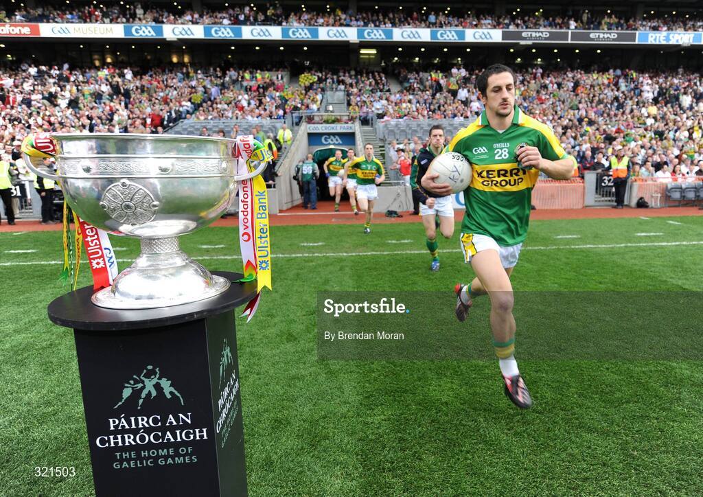 21 September 2008; Kerry's Paul Galvin runs past the Sam Maguire Cup as the Kerry team run out onto the pitch before the game. GAA Football All-Ireland Senior Championship Final, Kerry v Tyrone, Croke Park, Dublin. Picture credit: Brendan Moran / SPORTSFILE