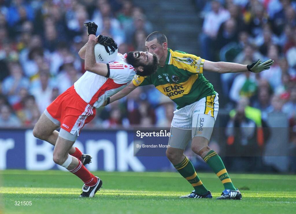 21 September 2008; Joe McMahon, Tyrone, falls after a challenge by Kieran Donaghy, Kerry. GAA Football All-Ireland Senior Championship Final, Kerry v Tyrone, Croke Park, Dublin. Picture credit: Brendan Moran / SPORTSFILE