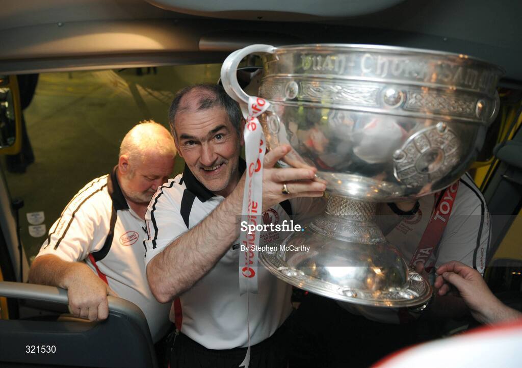 21 September 2008; Tyrone manager Mickey Harte brings the Sam Maguire cup onto the bus. GAA Football All-Ireland Senior Championship Final, Kerry v Tyrone, Croke Park, Dublin. Picture credit: Stephen McCarthy / SPORTSFILE