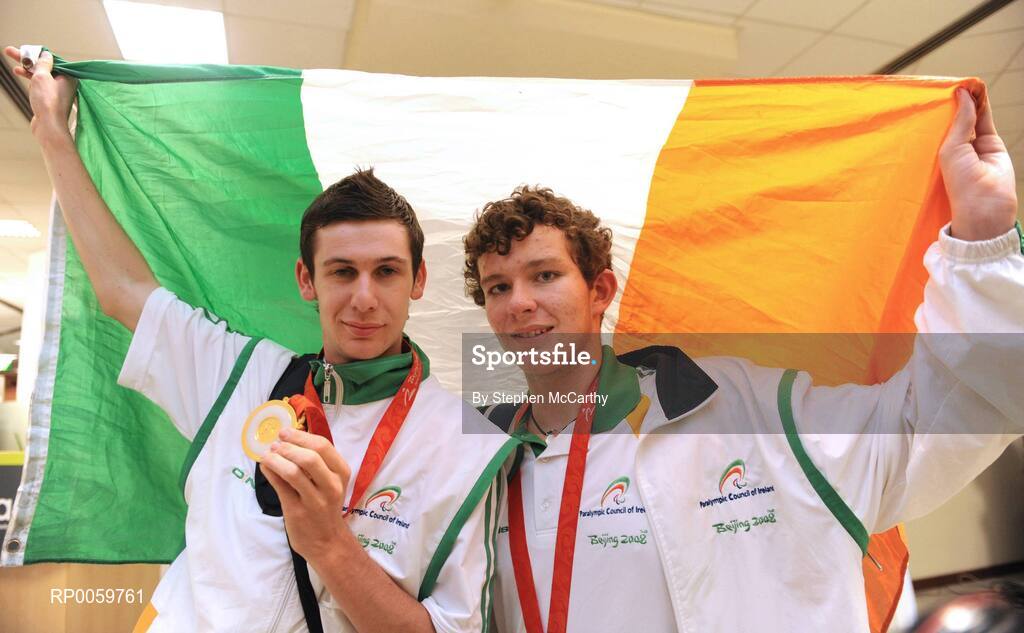 19 September 2008; Michael McKillop, from Glengormley, Co. Antrim, who won a gold medal in the Men's 800m - T37, left, and Darragh McDonald, from Gorey, Co. Wexford, who won a silver medal in the Men's 400m Freestyle - S6 Final, at Dublin Airport as the Irish Paralympic Team arrived home from Beijing. Dublin Airport, Dublin. Picture credit: Stephen McCarthy / SPORTSFILE