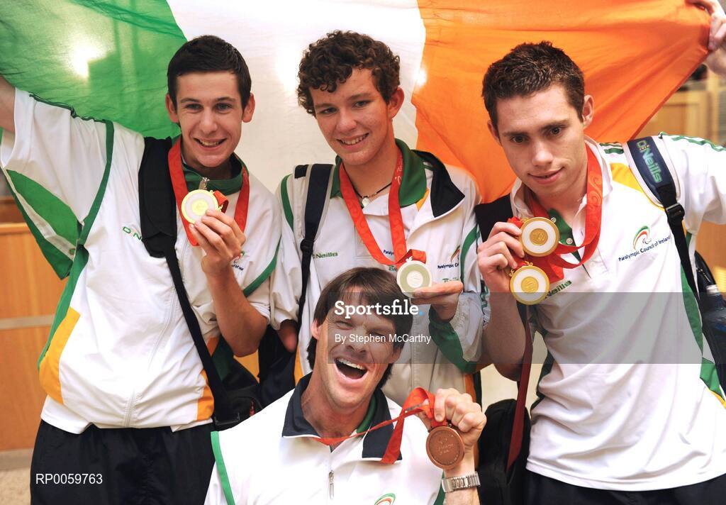 19 September 2008; Irish athletes, from left, Michael McKillop, from Glengormley, Co. Antrim, who won a gold medal in the Men's 800m - T37, Darragh McDonald, from Gorey, Co. Wexford, who won a silver medal in the Men's 400m Freestyle - S6 Final, Jason Smyth, from Eglinton, Co. Derry, who won two gold medals in the Men's 200m -T13 Final and Men's 100m T13 Final and Gabriel Shelly, from Bagenalstown, Co. Carlow, who won a bronze medal in the Boccia Mixed Individual - BC1, front, at Dublin Airport as the Irish Paralympic Team arrived home from Beijing. Dublin Airport, Dublin. Picture credit: Stephen McCarthy / SPORTSFILE