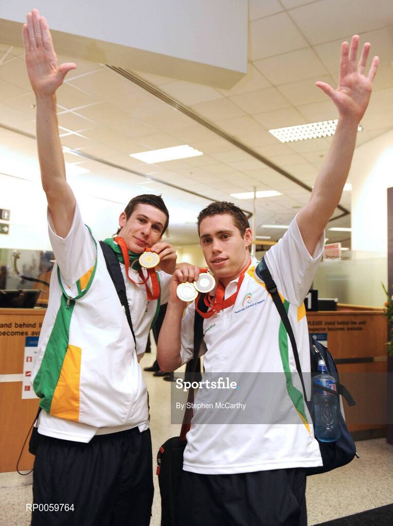 19 September 2008; Michael McKillop, from Glengormley, Co. Antrim, who won a gold medal in the Men's 800m - T37, left, and Jason Smyth, from Eglinton, Co. Derry, who won two gold medals in the Men's 200m -T13 Final and Men's 100m T13 Final, at Dublin Airport as the Irish Paralympic Team arrived home from Beijing. Dublin Airport, Dublin. Picture credit: Stephen McCarthy / SPORTSFILE