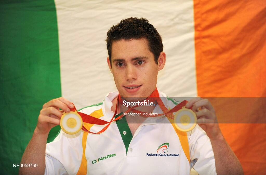 19 September 2008; Jason Smyth, from Eglinton, Co. Derry, who won two gold medals in the Men's 200m -T13 Final and Men's 100m T13 Final, at Dublin Airport as the Irish Paralympic Team arrived home from Beijing. Dublin Airport, Dublin. Picture credit: Stephen McCarthy / SPORTSFILE