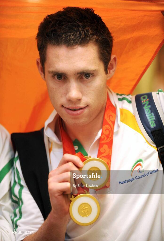 19 September 2008; Jason Smyth, from Eglinton, Co. Derry, who won two gold medals in the Men's 200m -T13 Final and Men's 100m T13 Final, at Dublin Airport as the Irish Paralympic Team arrived home from Beijing. Dublin Airport, Dublin. Picture credit: Brian Lawless / SPORTSFILE