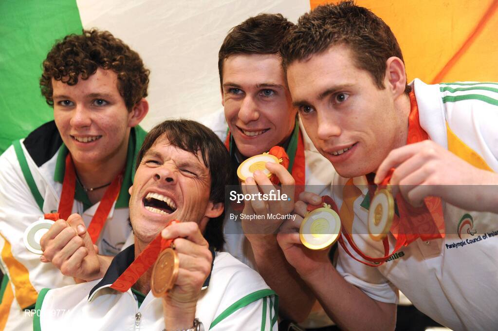 19 September 2008; Irish athletes, from left, Darragh McDonald, from Gorey, Co. Wexford, Gabriel Shelly, from Bagenalstown, Co. Carlow, who won a bronze medal in the Boccia Mixed Individual - BC1, who won a silver medal in the Men's 400m Freestyle - S6 Final, Michael McKillop, from Glengormley, Co. Antrim, who won a gold medal in the Men's 800m - T37 and Jason Smyth, from Eglinton, Co. Derry, who won two gold medals in the Men's 200m -T13 Final and Men's 100m T13 Final, at Dublin Airport as the Irish Paralympic Team arrived home from Beijing. Dublin Airport, Dublin. Picture credit: Stephen McCarthy / SPORTSFILE