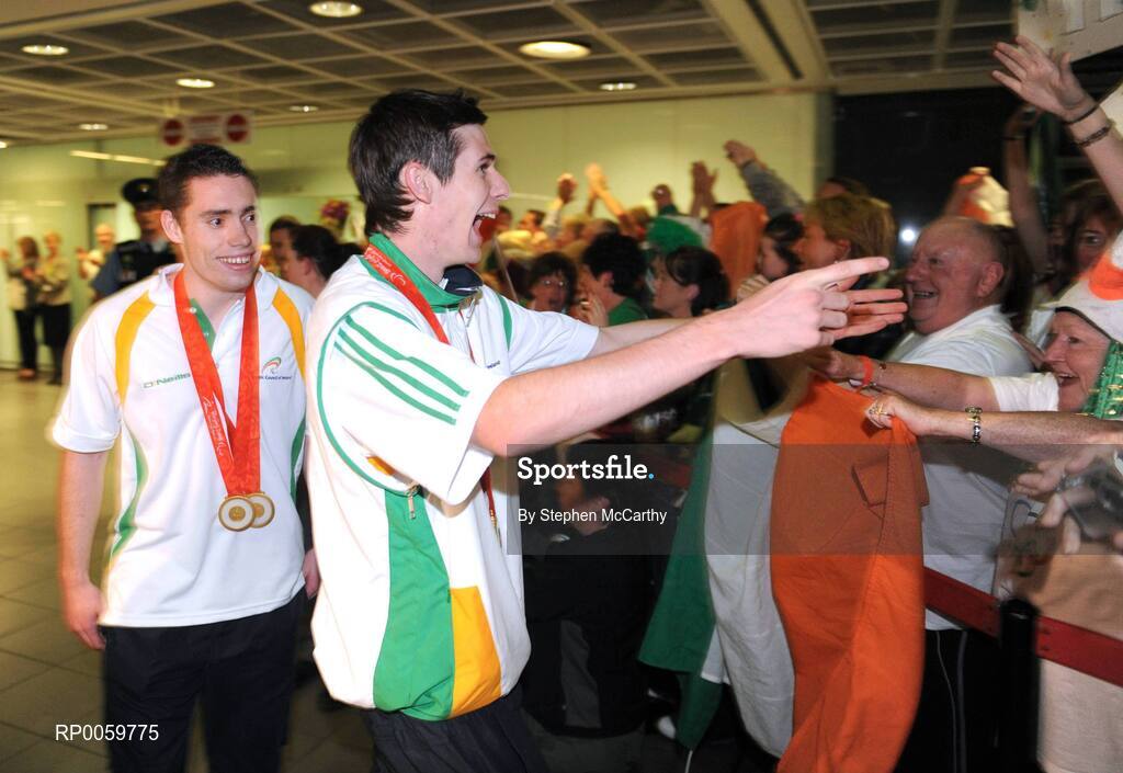 19 September 2008; Irish athletes Jason Smyth, left, from Eglinton, Co. Derry, who won two gold medals in the Men's 200m -T13 Final and Men's 100m T13 Final, and Michael McKillop, from Glengormley, Co. Antrim, who won a gold medal in the Men's 800m - T37, at Dublin Airport as the Irish Paralympic Team arrived home from Beijing. Dublin Airport, Dublin. Picture credit: Stephen McCarthy / SPORTSFILE