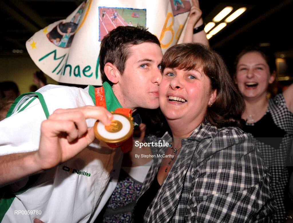 19 September 2008; Michael McKillop, from Glengormley, Co. Antrim, who won a gold medal in the Men's 800m - T37, with his mother Catherine at Dublin Airport as the Irish Paralympic Team arrived home from Beijing. Dublin Airport, Dublin. Picture credit: Stephen McCarthy / SPORTSFILE