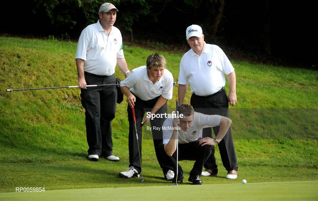20 September 2008; Tim O'Connell, Clontarf Golf Club, lines up a putt on the 10th with assistance from his caddy Barry Hallinan, left,  playing partner Conor Harrington and his caddy Gerry Harrington during the Bulmers Jimmy Bruen Shield Final. Bulmers Cups and Shields Finals 2008, Monkstown Golf Club, Parkgarriff, Monkstown, Co. Cork. Picture credit: Ray McManus / SPORTSFILE