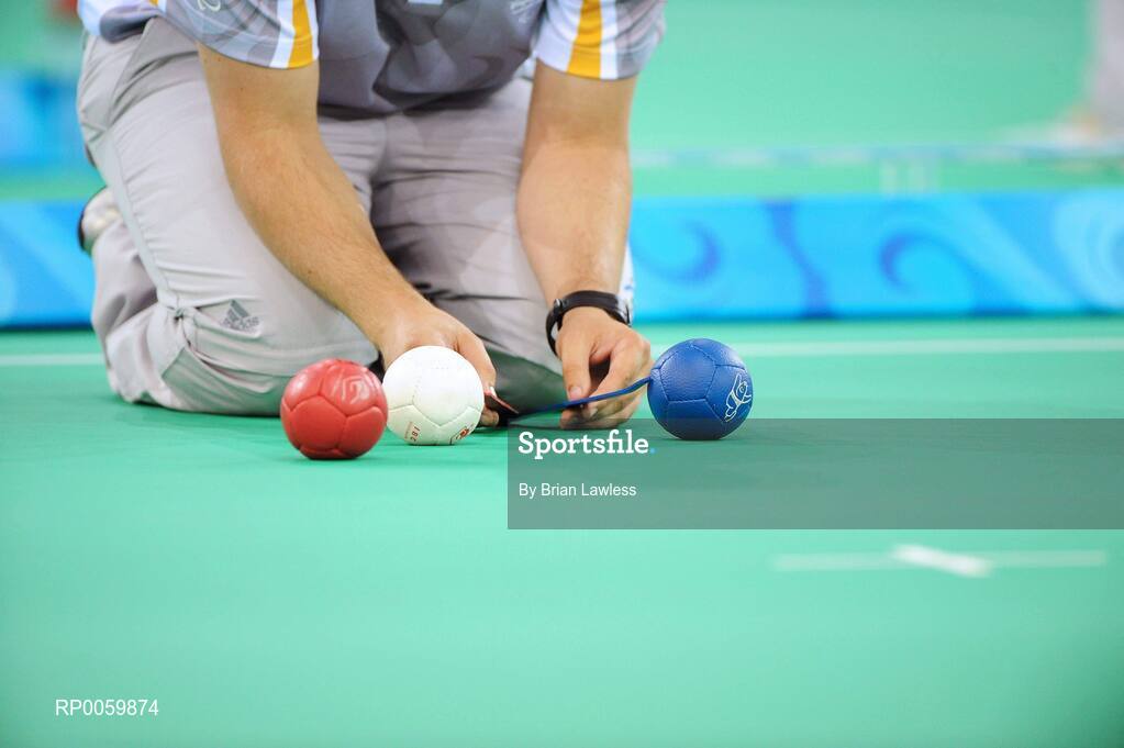 7 September 2008; Distance is measured by an umpire during the match. Beijing Paralympic Games 2008, Mixed Individual Boccia BC2, Pool B, Fencing Hall of National Convention Centre, Olympic Green, Beijing, China. Picture credit: Brian Lawless / SPORTSFILE