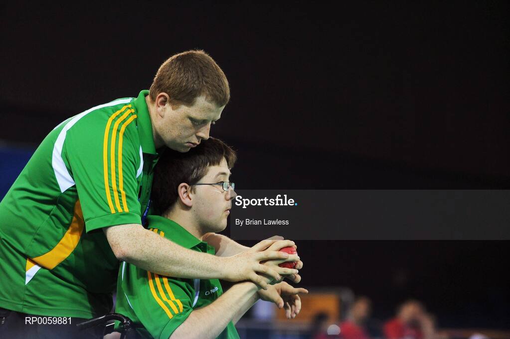 7 September 2008; Padraic Moran, from Bray, Dublin, with assistant Robert Roe, from Bray, Wicklow, during his opening pool match of the Individual Boccia competition against David Smith of Great Britain. Padraic won his match 9-0. Beijing Paralympic Games 2008, Mixed Individual Boccia BC1, Pool B, Fencing Hall of National Convention Centre, Olympic Green, Beijing, China. Picture credit: Brian Lawless / SPORTSFILE