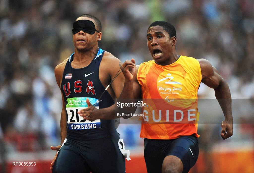 8 September 2008; USA's Nelacey Porter, runs with his guide during the Men's 100m - T11 Round 1 Heat 3. Beijing Paralympic Games 2008, Men's 100m - T11 Round 1 Heat 3, National Stadium, Olympic Green, Beijing, China. Picture credit: Brian Lawless / SPORTSFILE