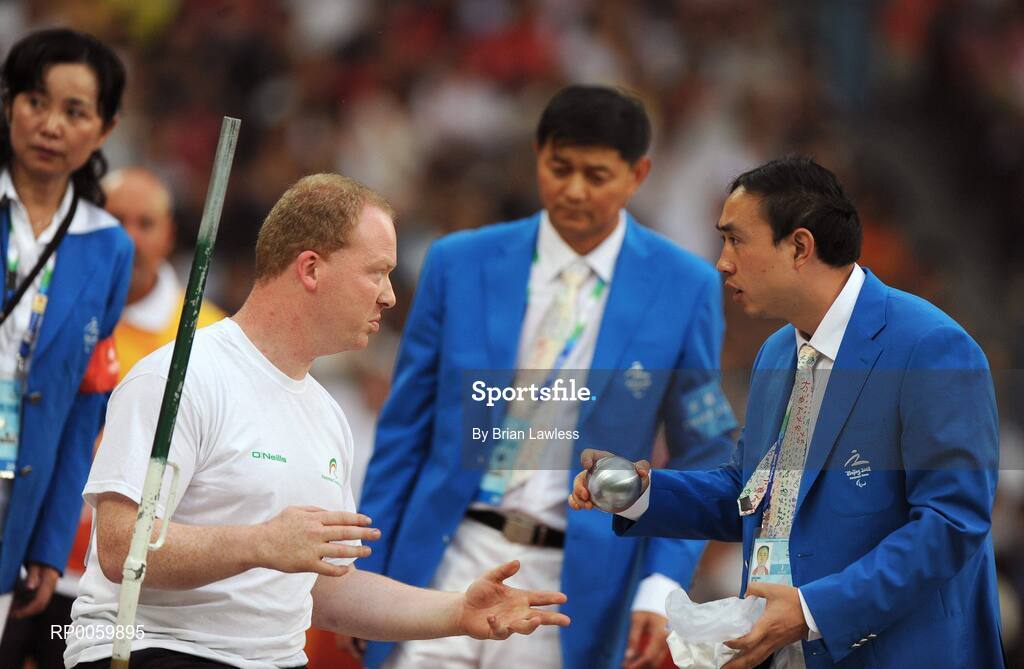 8 September 2008; Eoin Cleare, from Birr, Co. Offaly, in conversation with an official during the Men's Shot Putt Final - F32. Eoin finished in 7th position overall with a distance of 6.11m. Beijing Paralympic Games 2008, Men's Shot Putt Final F32, National Stadium, Olympic Green, Beijing, China. Picture credit: Brian Lawless / SPORTSFILE