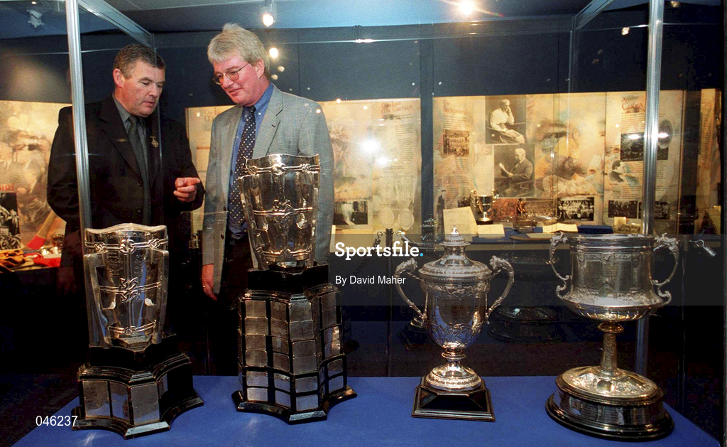 23 August 2000; Michael MacCarthy, right, great grandson of Liam MacCarthy, and Uachtarán Chumann Lúthchleas Gael Sean McCague pictured with the four All-Ireland Senior Hurling Championship trophies played for since the late 19th century, which were together for the first time, at the opening of an exhibition commemorating Liam MacCarthy at the GAA Museum in Croke Park Photo by David Maher/Sportsfile