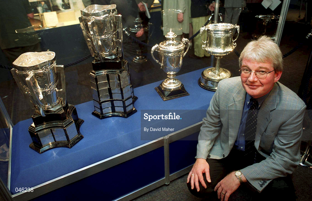 23 August 2000; Michael MacCarthy, great grandson of Liam MacCarthy, pictured with the four All-Ireland Senior Hurling Championship trophies played for since the late 19th century, which were together for the first time, at the opening of an exhibition commemorating Liam MacCarthy at the GAA Museum in Croke Park Photo by David Maher/Sportsfile