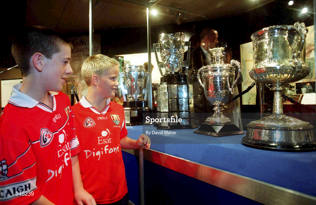 23 August 2000; David Bouse age 12, left, and Jack O'Halloran age 9, both from Ballygarvan in Cork, pictured with the four All-Ireland Senior Hurling Championship trophies played for since the late 19th century, which were together for the first time, at the opening of an exhibition commemorating Liam MacCarthy at the GAA Museum in Croke Park Photo by David Maher/Sportsfile