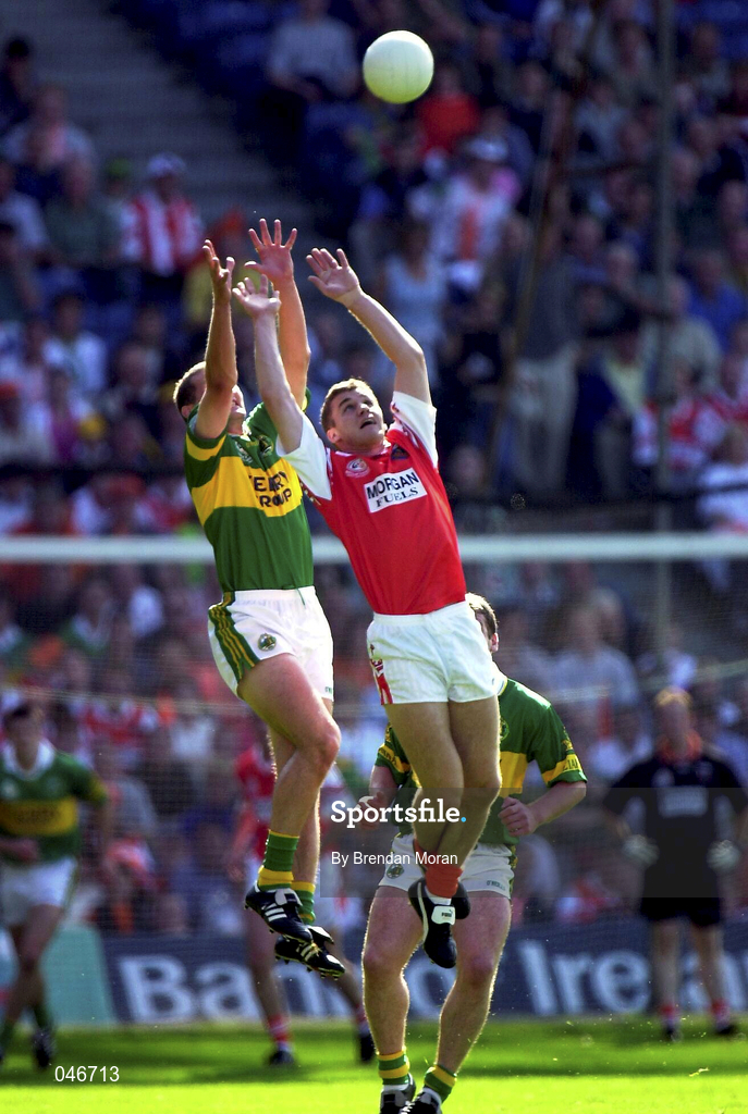 2 September 2000; Donal Daly of Kerry in action against John McEntee of Armagh during the Bank of Ireland All-Ireland Senior Football Championship Semi-Final replay match between Kerry and Armagh at Croke Park in Dublin. Photo by Brendan Moran/Sportsfile
