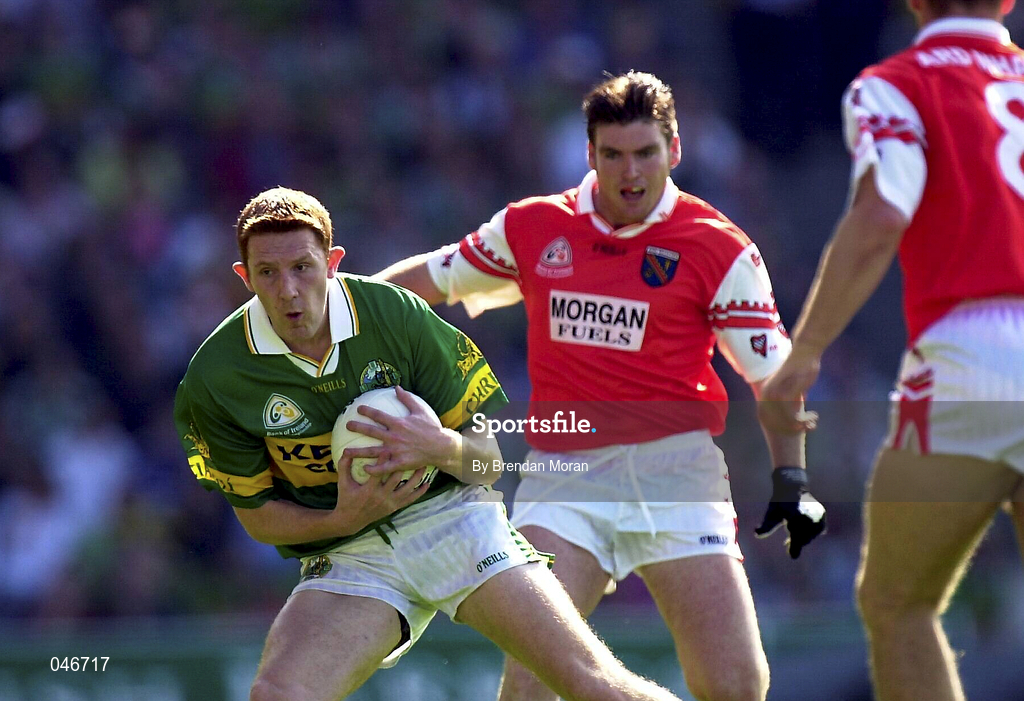 2 September 2000; Noel Kennelly of Kerry in action against Kieran Hughes of Armagh during the Bank of Ireland All-Ireland Senior Football Championship Semi-Final replay match between Kerry and Armagh at Croke Park in Dublin. Photo by Brendan Moran/Sportsfile