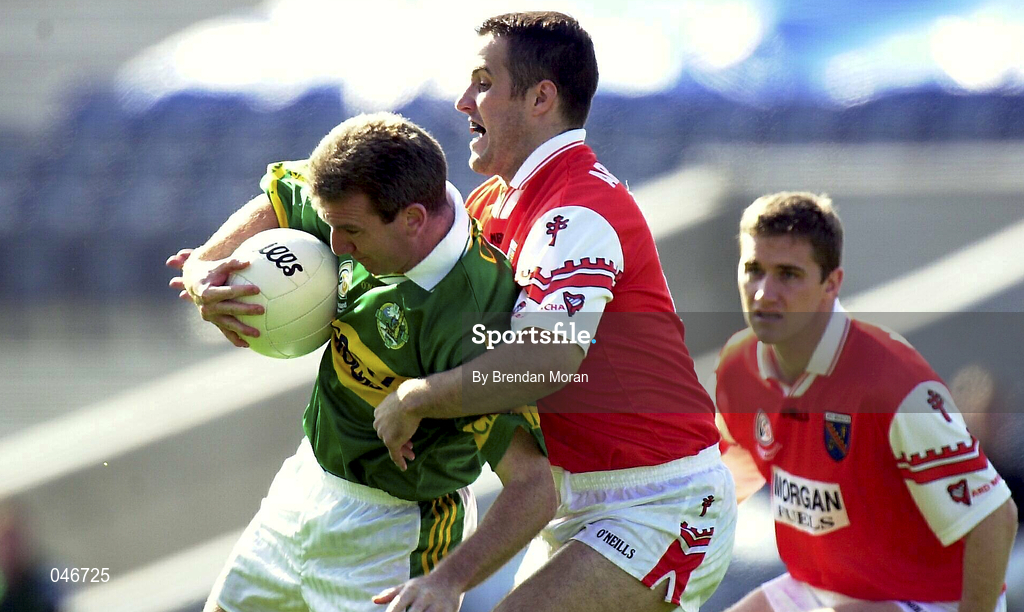 2 September 2000; Mike Hassett of Kerry in action against Barry O'Hagan of Armagh during the Bank of Ireland All-Ireland Senior Football Championship Semi-Final replay match between Kerry and Armagh at Croke Park in Dublin. Photo by Brendan Moran/Sportsfile