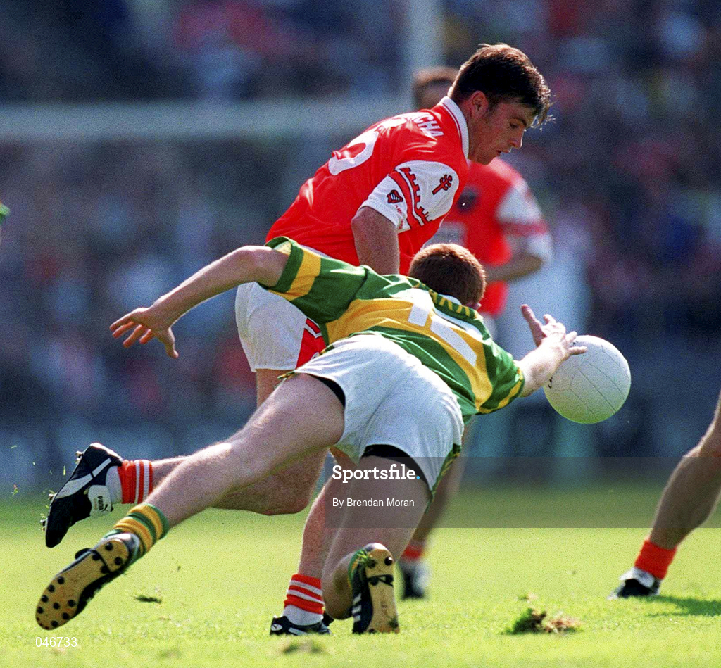 2 September 2000; Kieran Hughes of Armagh in action against Noel Kennelly of Kerry during the Bank of Ireland All-Ireland Senior Football Championship Semi-Final replay match between Kerry and Armagh at Croke Park in Dublin. Photo by Brendan Moran/Sportsfile
