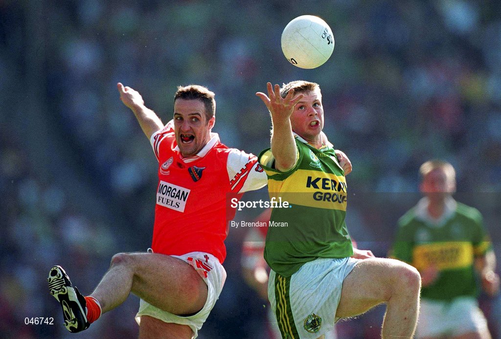 2 September 2000; Tomás Ó Sé of Kerry in action against Barry O'Hagan of Armagh during the Bank of Ireland All-Ireland Senior Football Championship Semi-Final replay match between Kerry and Armagh at Croke Park in Dublin. Photo by Brendan Moran/Sportsfile