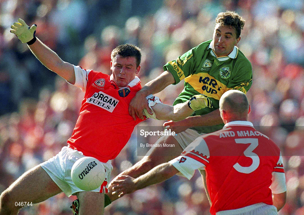 2 September 2000; Maurice Fitzgerald of Kerry in action against Justin McNulty, left, and Gerard Reid of Armagh during the Bank of Ireland All-Ireland Senior Football Championship Semi-Final replay match between Kerry and Armagh at Croke Park in Dublin. Photo by Brendan Moran/Sportsfile