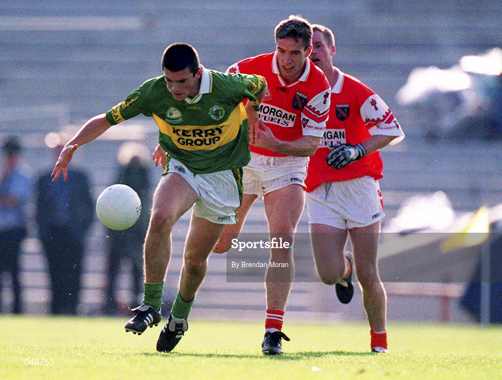 2 September 2000; Aodan MacGearailt of Kerry in action against Kieran McGeeney of Armagh during the Bank of Ireland All-Ireland Senior Football Championship Semi-Final replay match between Kerry and Armagh at Croke Park in Dublin. Photo by Brendan Moran/Sportsfile