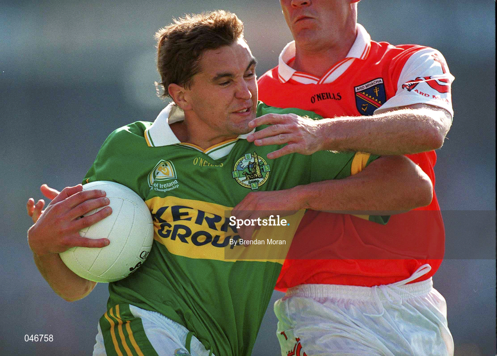 2 September 2000; Maurice Fitzgerald of Kerry in action against Gerard Reid of Armagh during the Bank of Ireland All-Ireland Senior Football Championship Semi-Final replay match between Kerry and Armagh at Croke Park in Dublin. Photo by Brendan Moran/Sportsfile