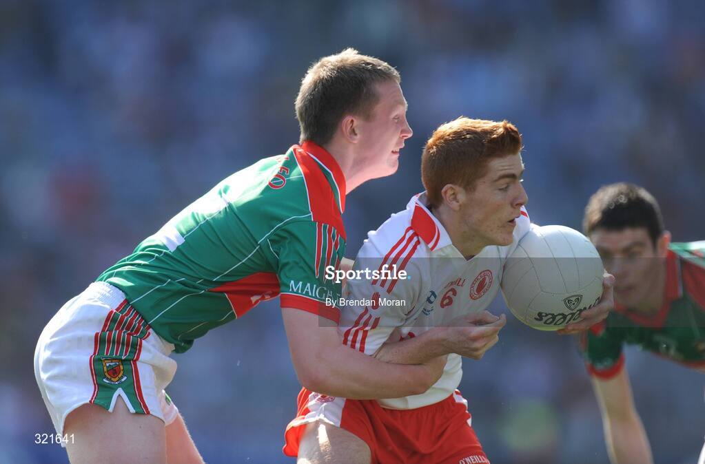 21 September 2008; Peter Harte, Tyrone, is tackled by Raymond Geraghty, Mayo. ESB GAA Football All-Ireland Minor Championship Final, Tyrone v Mayo, Croke Park, Dublin. Picture credit: Brendan Moran / SPORTSFILE