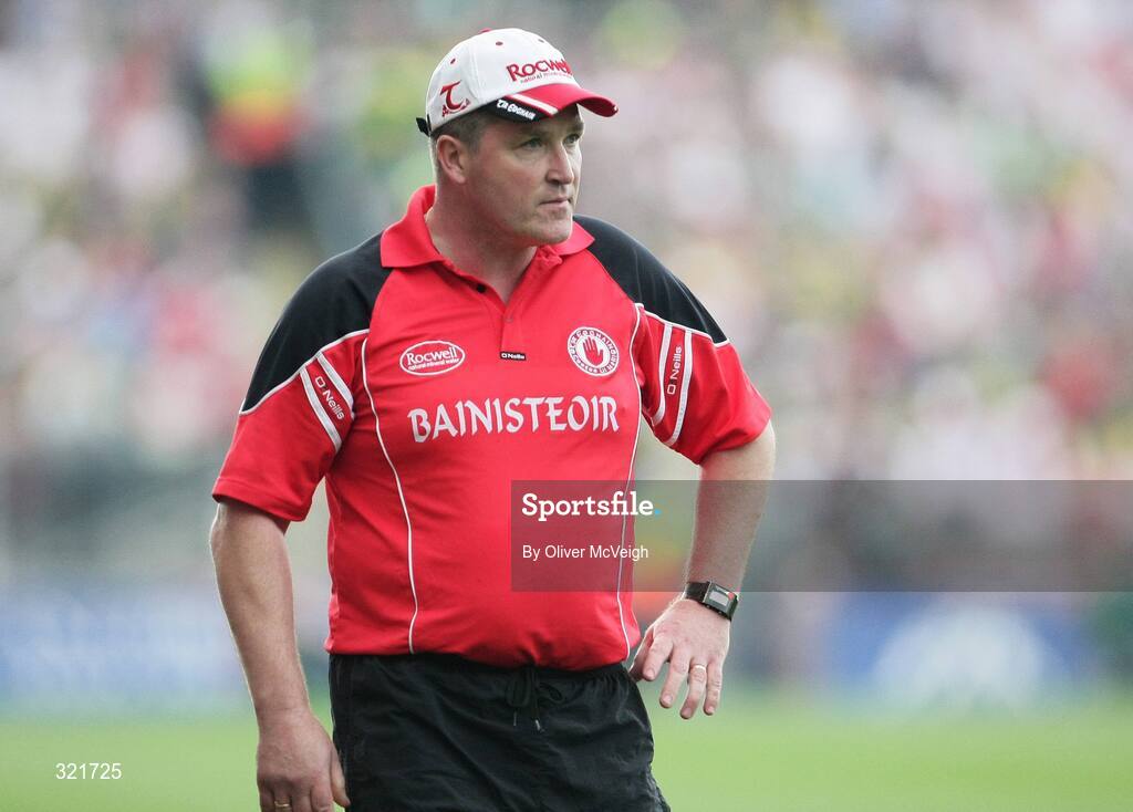 21 September 2008; Tyrone manager, Raymond Munroe, watches from the sideline. ESB GAA Football All-Ireland Minor Championship Final, Tyrone v Mayo, Croke Park, Dublin. Picture credit: Oliver McVeigh / SPORTSFILE