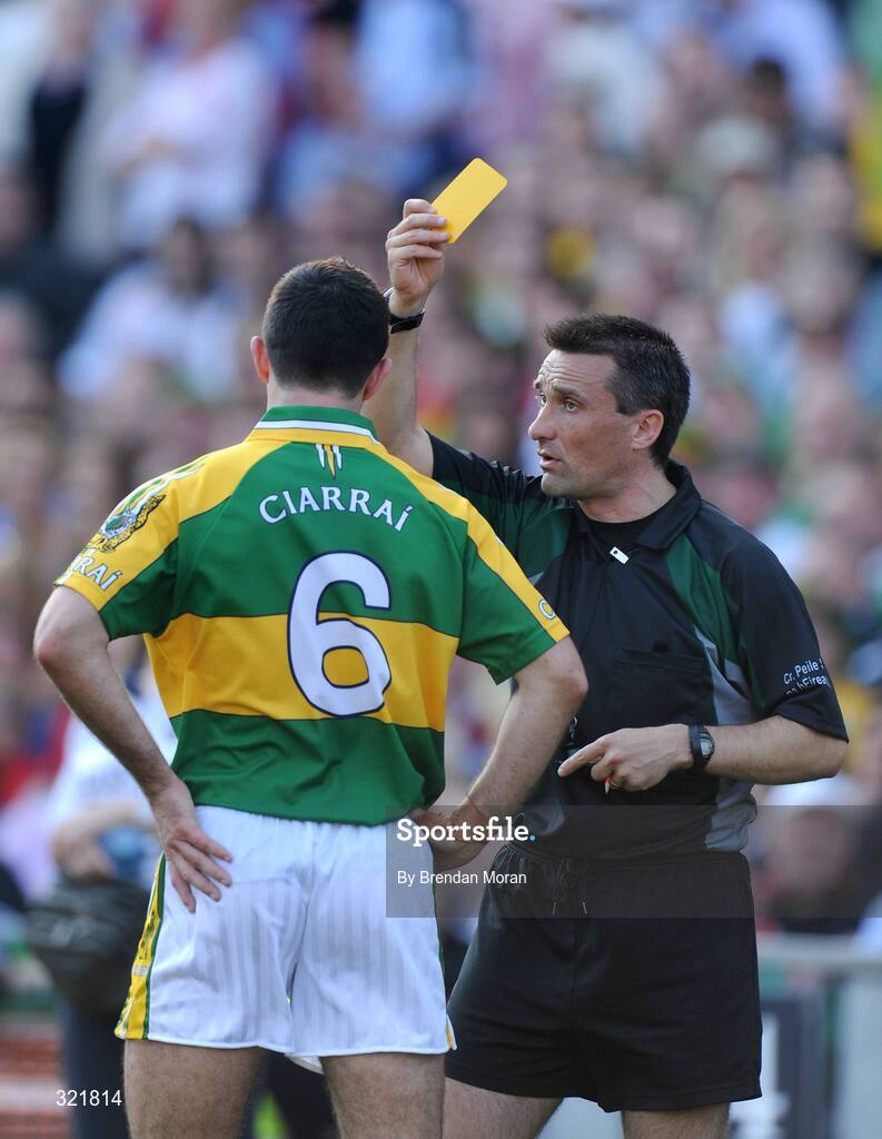 21 September 2008; Aidan O'Mahony, Kerry, is shown a yellow card by referee Maurice Deegan. GAA Football All-Ireland Senior Championship Final, Kerry v Tyrone, Croke Park, Dublin. Picture credit: Brendan Moran / SPORTSFILE
